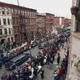 The funeral procession of Biggie Smalls passes as mourners line the streets near the building where the slain rapper once lived on St. James Place in the Bedford-Stuyvesant neighborhood of Brooklyn, N.Y., on March 18, 1997.